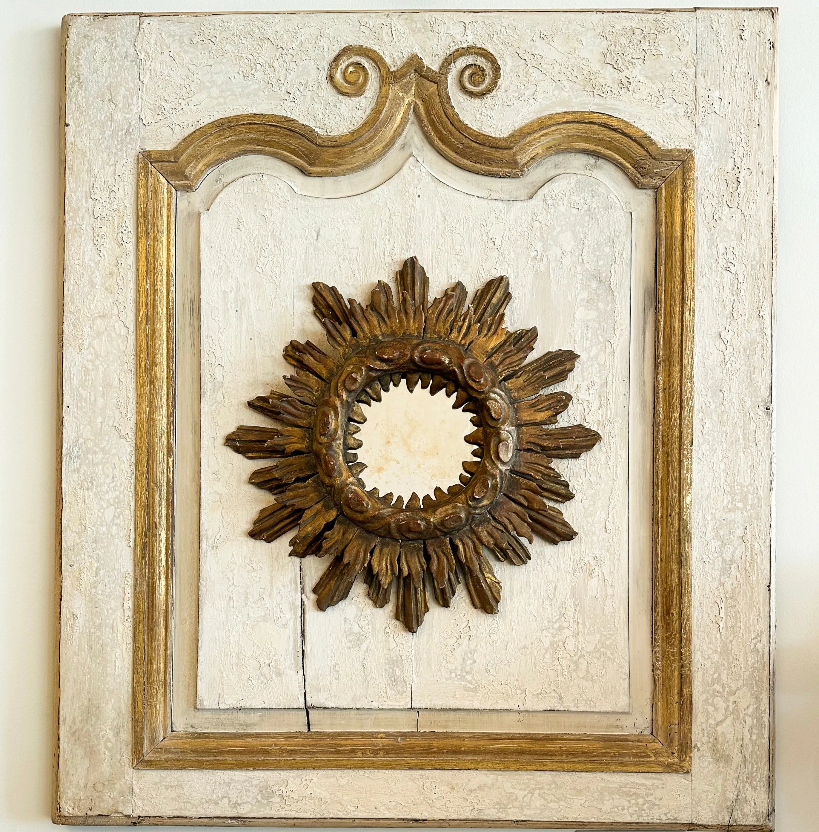 Antique Sunburst Mirror on Wooden Panel 