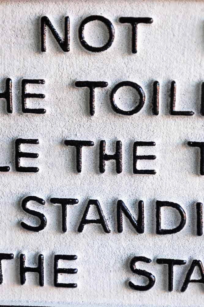Do Not Use The Toilet When The Train... Hanging Sign