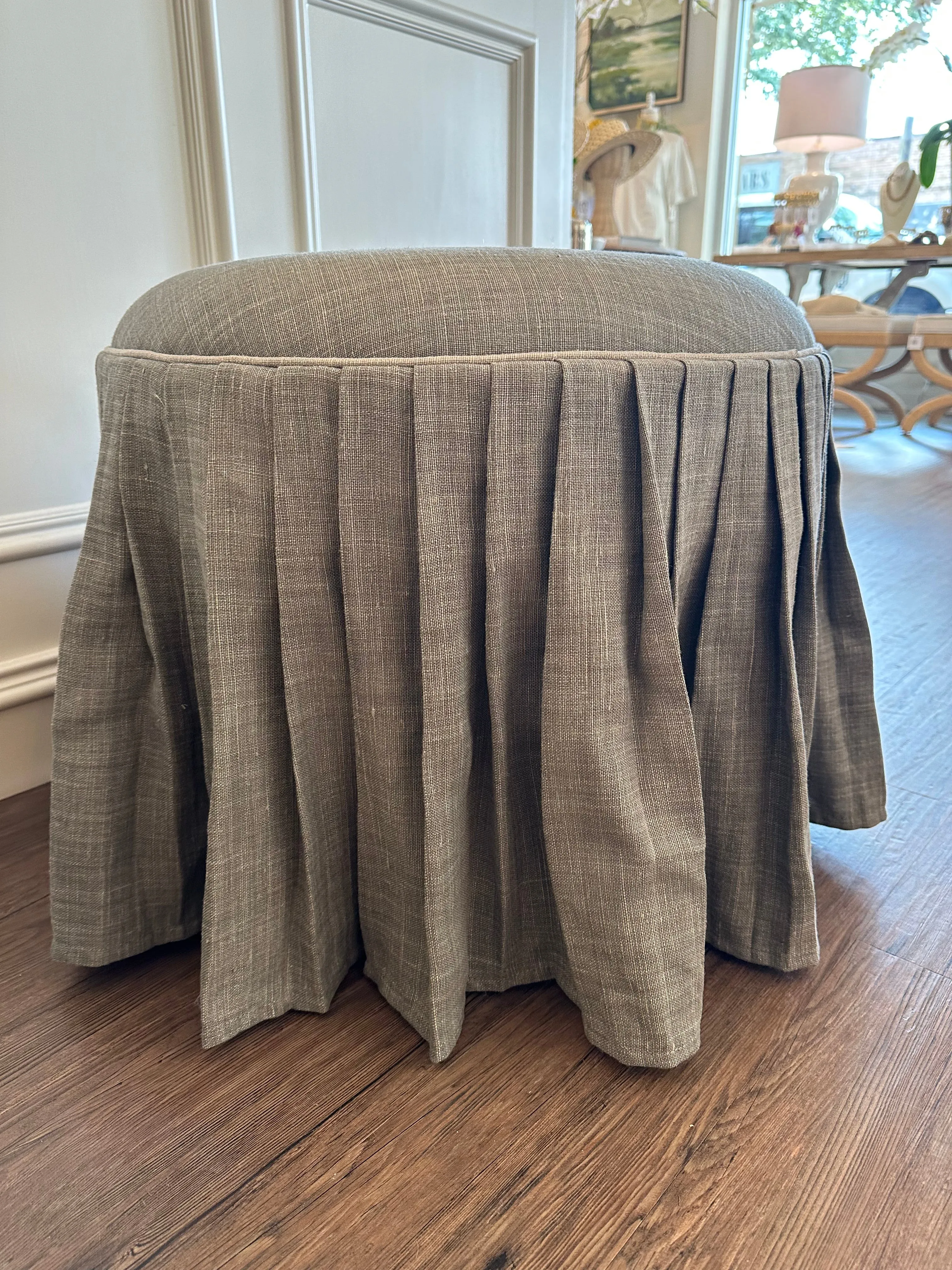 Pleated Ottoman in Gray Fabric with Silver Piping Detail 