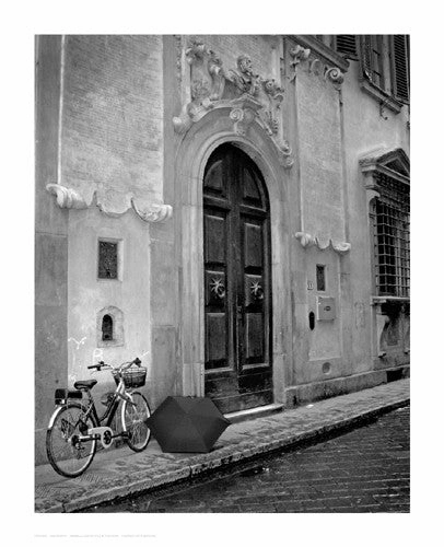 Umbrella and Bicycle by the Door 